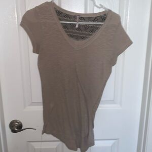 Cream colored v neck tee